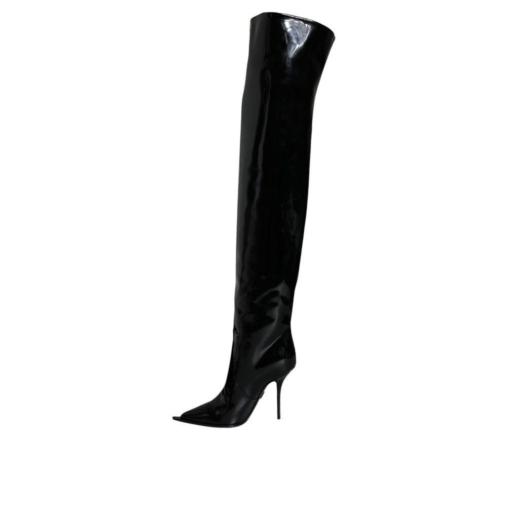 Corsets en cuir noir Dolce & Gabbana, cuissardes longues au-dessus du genou, en cuir noir avec détails sophistiqués.