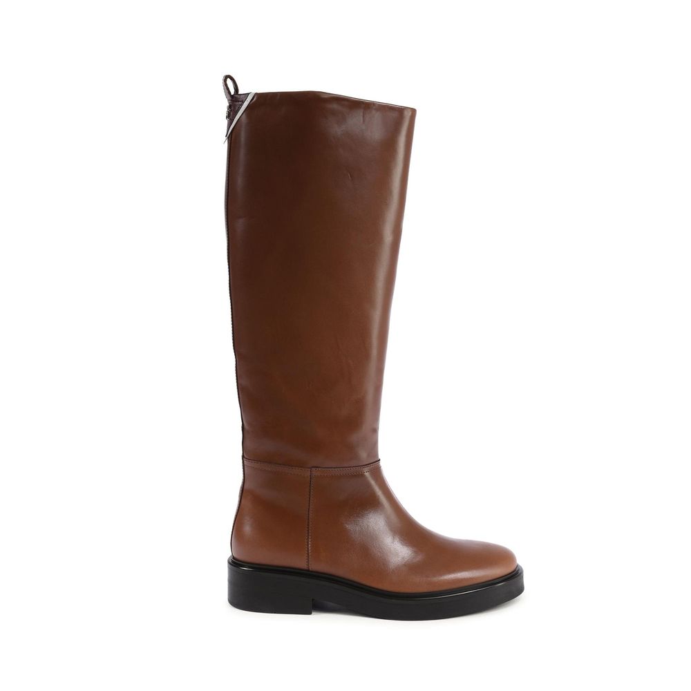 Bottes en cuir marron Tommy Hilfiger pour la cheville, style élégant et décontracté, avec fermeture à glissière sur le côté.