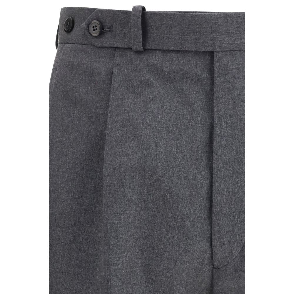 Pantalon Prada gris en laine Oves Aries pour femme, coupe élégante et classique, détail de couture visible.