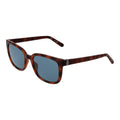 Lunettes de soleil en plastique marron Guess avec monture élégante et design moderne, vue de face.