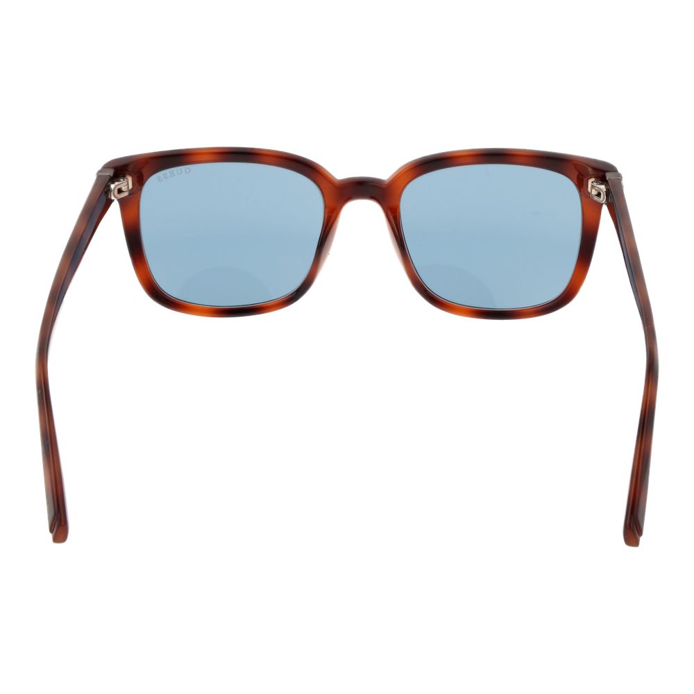 Lunettes de soleil en plastique marron Guess avec monture élégante et design moderne, pour un style tendance et protecteur.