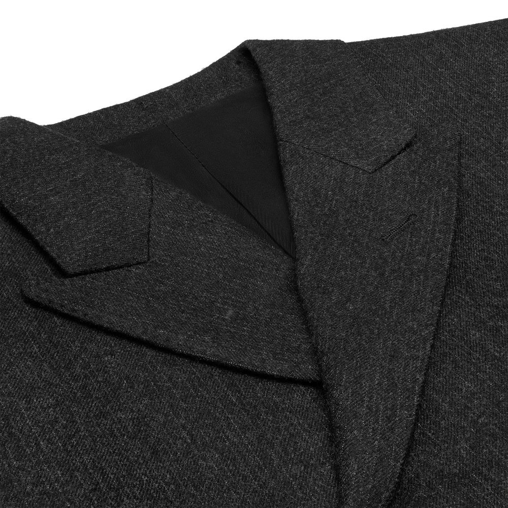 Veste blazer en laine grise de Celine, coupe élégante et classique, avec revers et boutons sophistiqués.