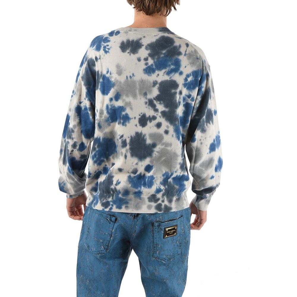 Sweat-shirt gris en coton de la marque Kenzo, coupe décontractée et style moderne, visible sur une mannequin.