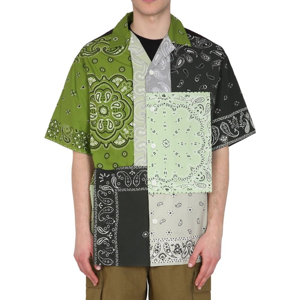 Chemise à manches courtes Kenzo Bicolor en coton, design moderne et coloré, visible en gros plan sur l'image.