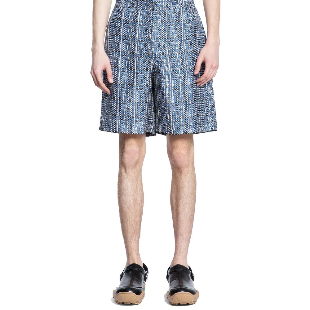 Jupe en soie bleue longueur genou de la marque Fendi, tissu élégant et fluide, portée ou portée dans un style chic.