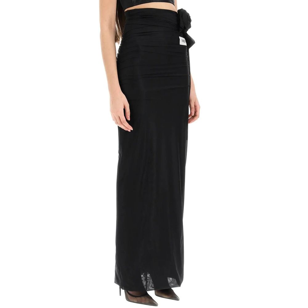 Jupe longue noire en élasthanne de Dolce & Gabbana, coupe élégante et tissu extensible visible sur l'image.