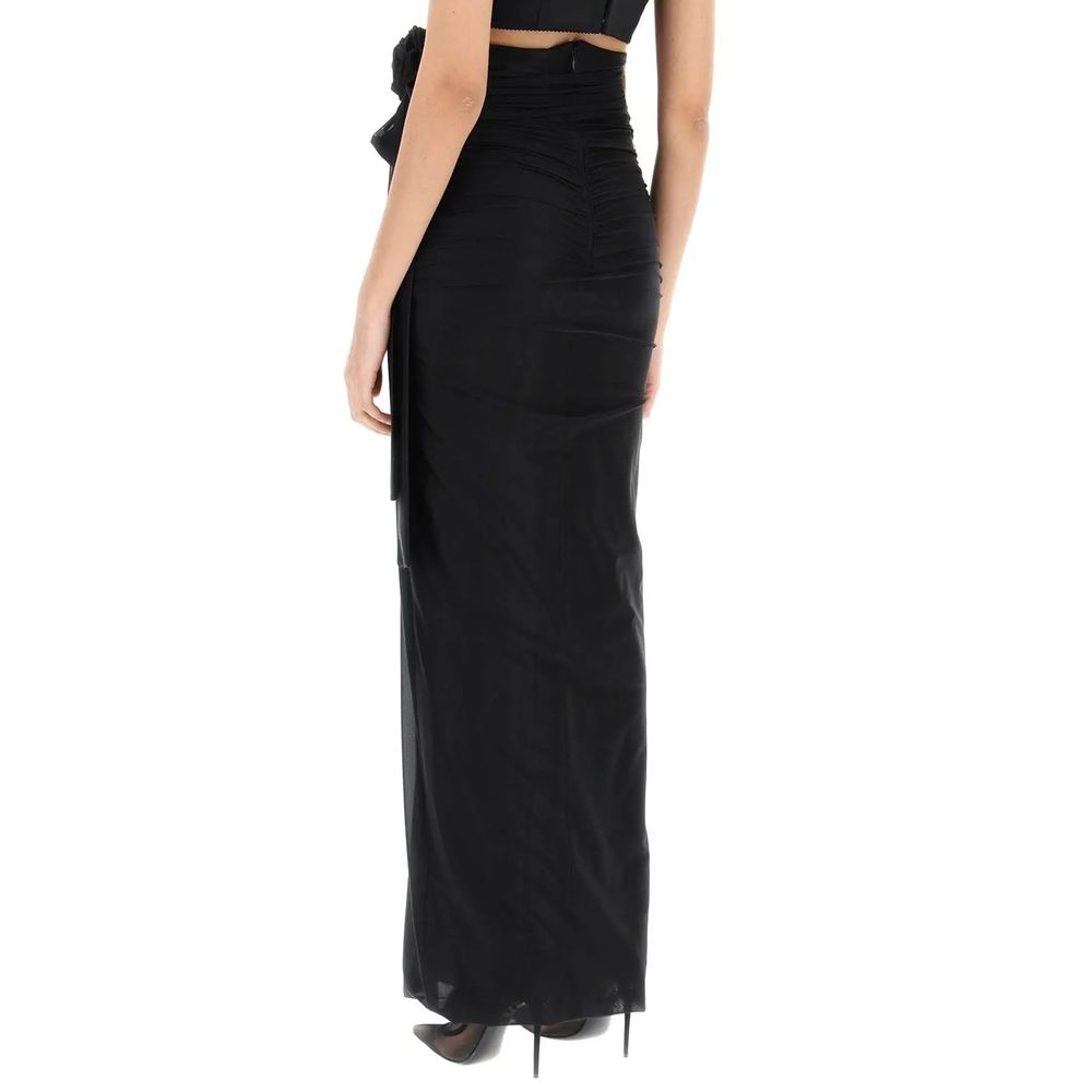 Jupe longue noire en élasthanne Dolce & Gabbana, coupe élégante et ajustée, visible dans l'image.