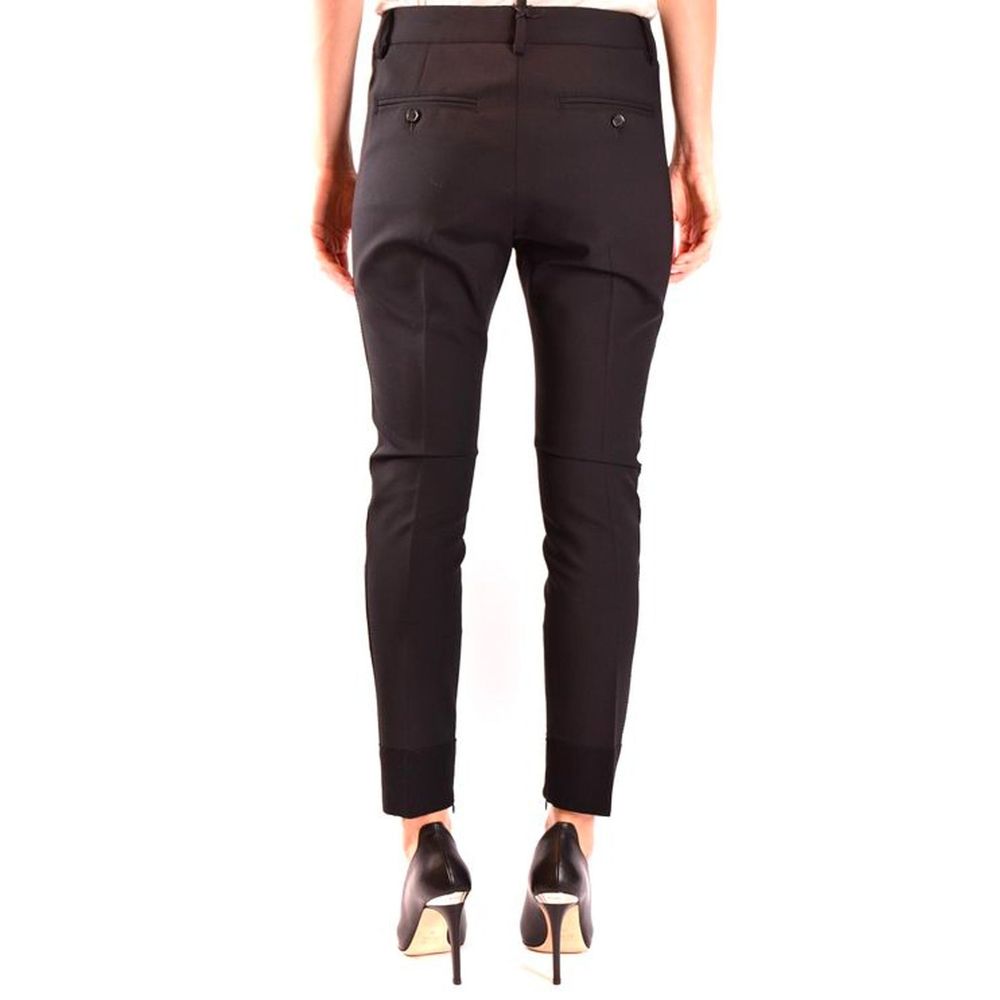 Pantalon en laine noire de la marque Dsquared², style élégant, coupe ajustée, porté sur un mannequin.
