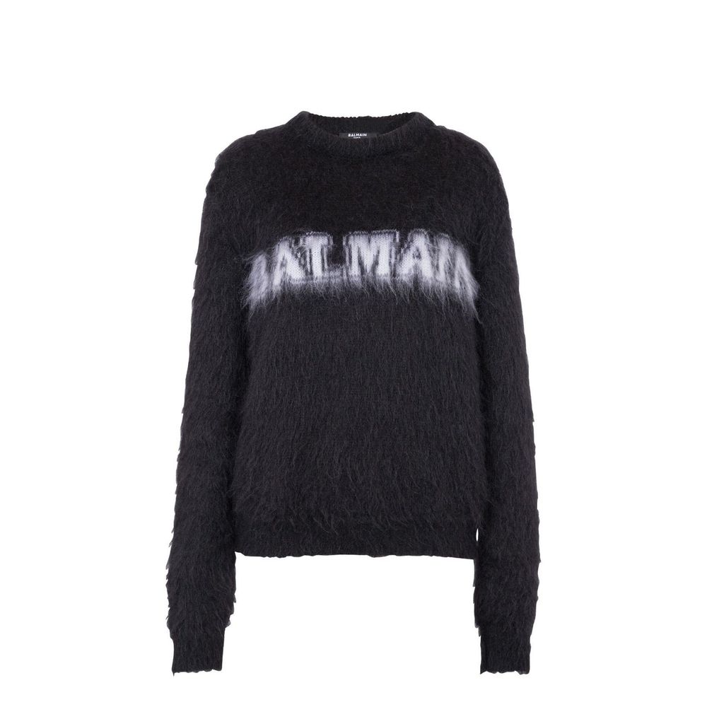 Sweatshirt noir en mohair de Balmain, coupe élégante, texture douce visible, vêtement à la mode pour un style sophistiqué.
