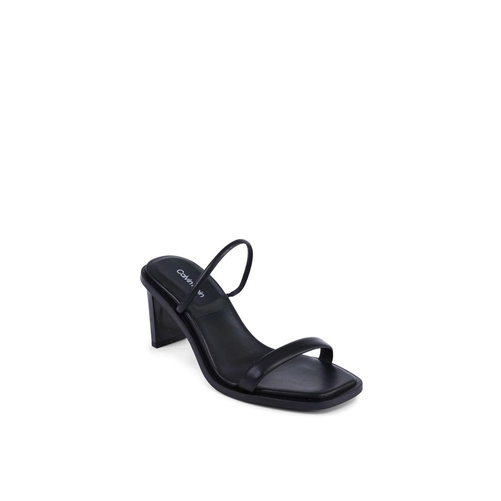 Sandales à talons aiguilles en cuir noir de Calvin Klein, élégantes et sophistiquées, vues de côté.