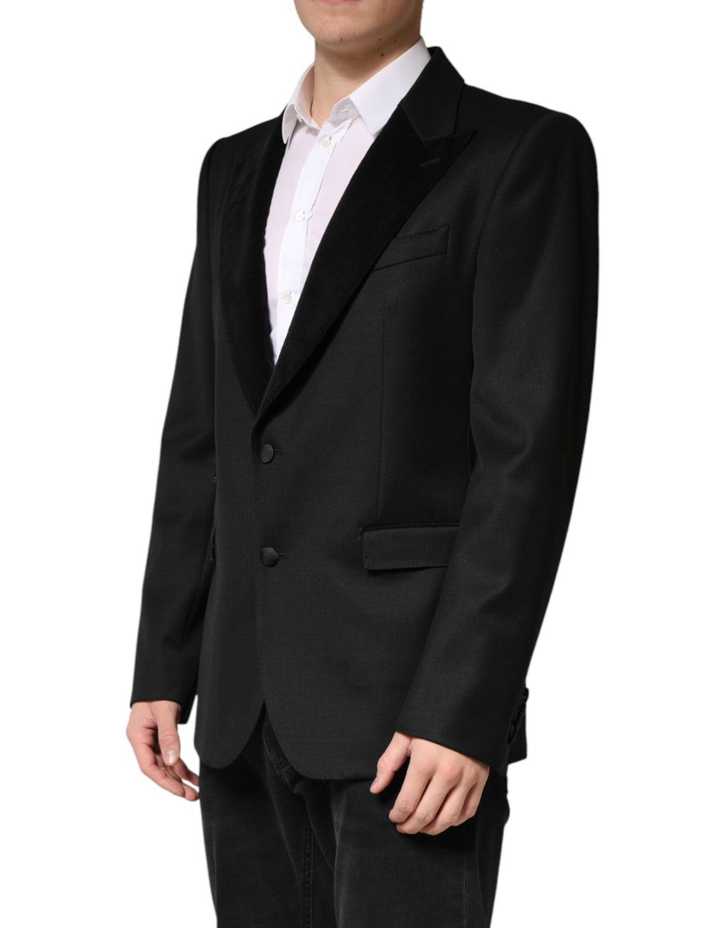 Veste blazer en laine noire Dolce & Gabbana à boutonnage simple, élégante et classique, portée sur un mannequin.