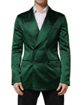 Blazer en satin vert Dolce & Gabbana à double boutonnage, style élégant et finition raffinée visible sur l'image.