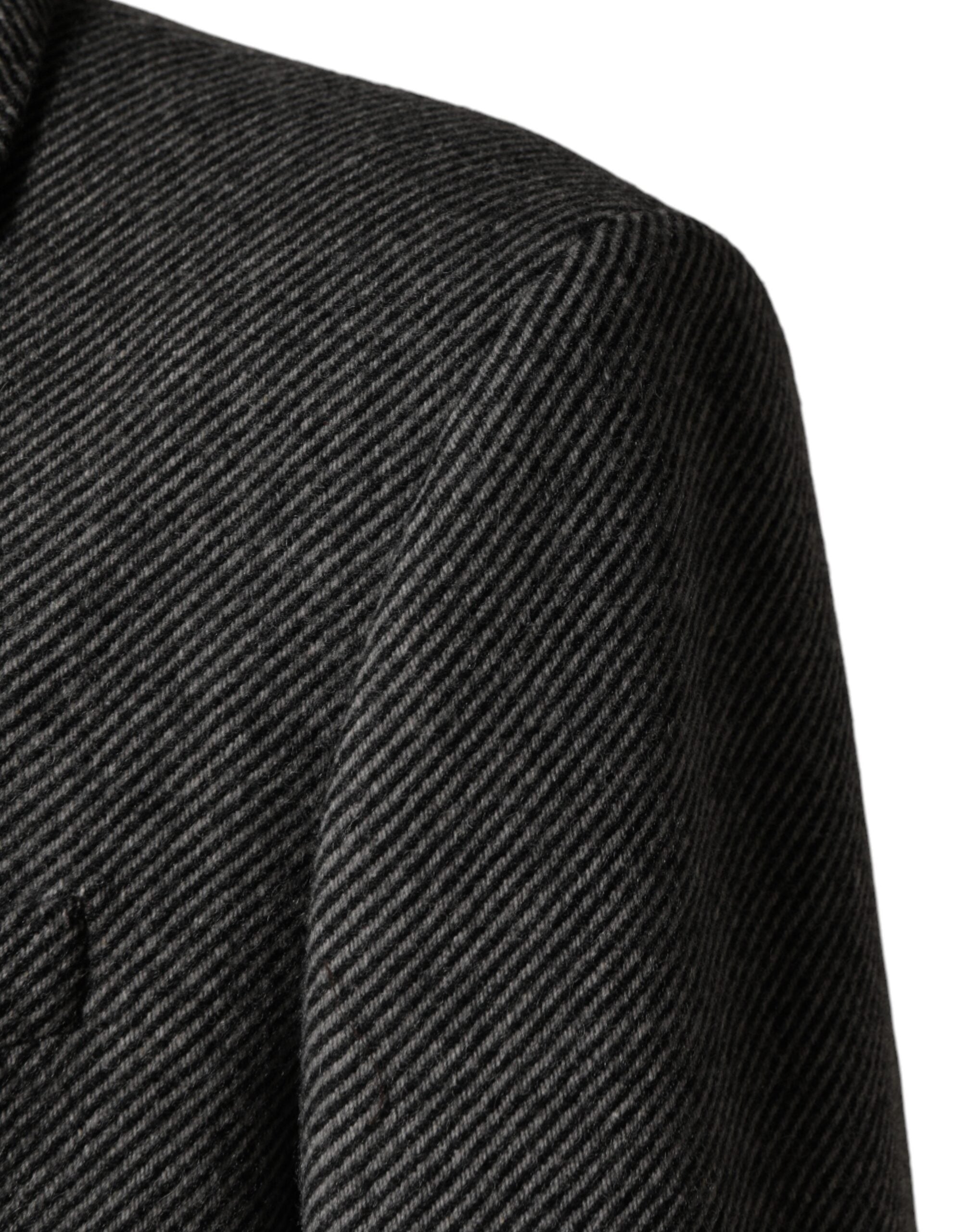 Imperméable homme gris à simple boutonnage Dolce & Gabbana, veste trench classique avec col et poches latérales.