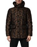 Veste matelassée noire avec capuche de Dolce & Gabbana, jacquard floral et design élégant.