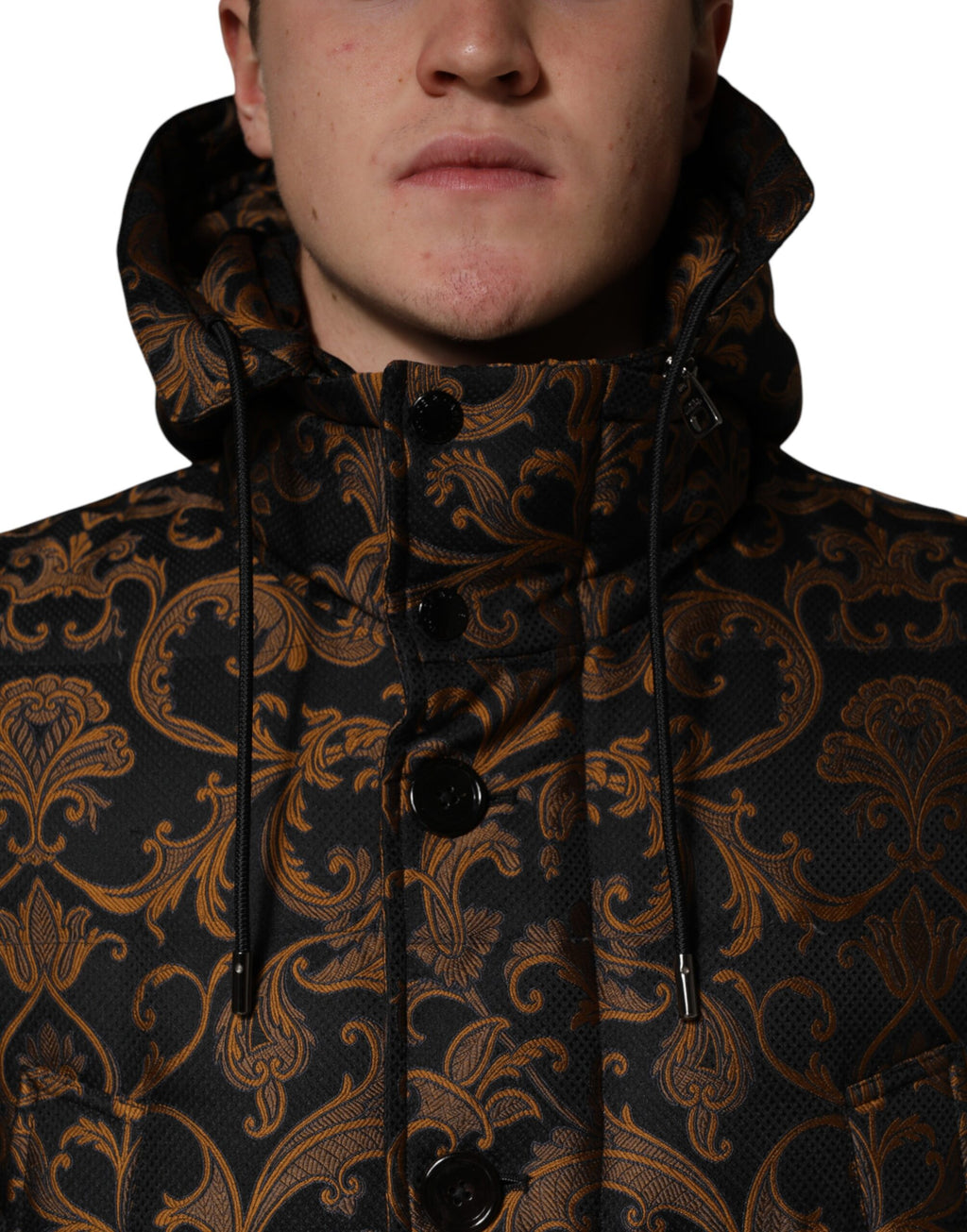 Veste matelassée à capuche Dolce & Gabbana en jacquard floral noir, style élégant et tendance.