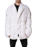 Parka homme Dolce & Gabbana en soie blanche, veste matelassée élégante avec capuche et fermeture éclair.