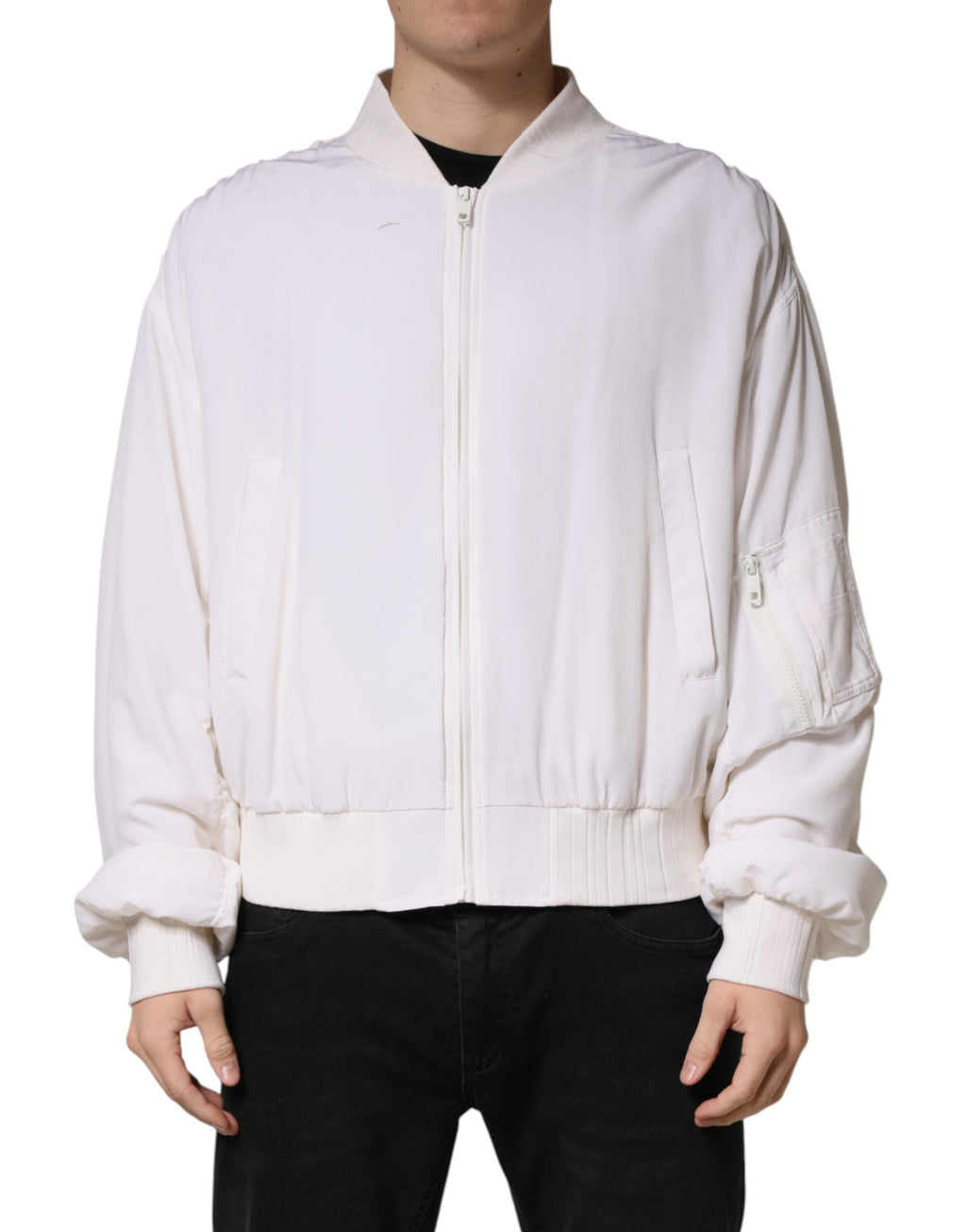 Veste bomber blanche en soie Dolce & Gabbana avec fermeture éclair complète, style élégant et sophistiqué.