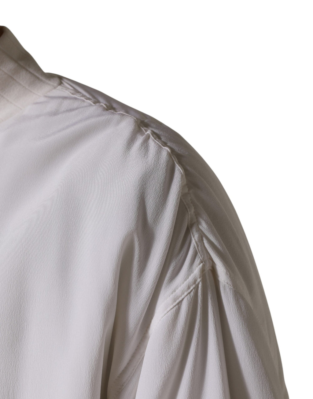 Veste bomber blanche en soie Dolce & Gabbana avec fermeture éclair complète, style élégant et moderne, vue de face.