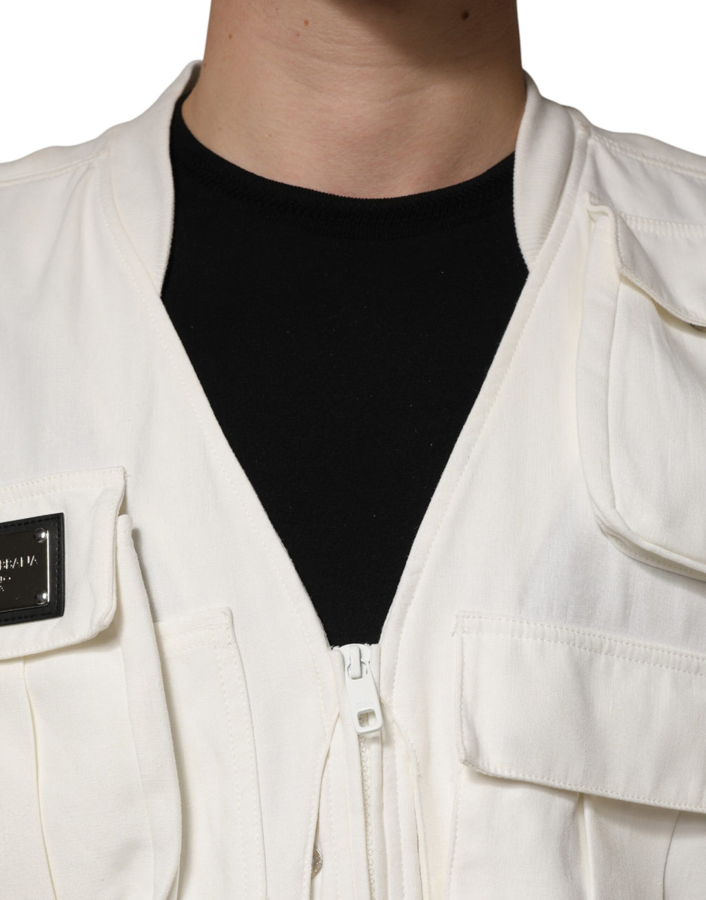 Veste homme Dolce & Gabbana en coton blanc avec poches cargo, style parka ou veste longue élégante.