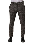 Pantalon skinny en laine à carreaux marron de Dolce & Gabbana, style élégant et ajusté, visible sur un mannequin.