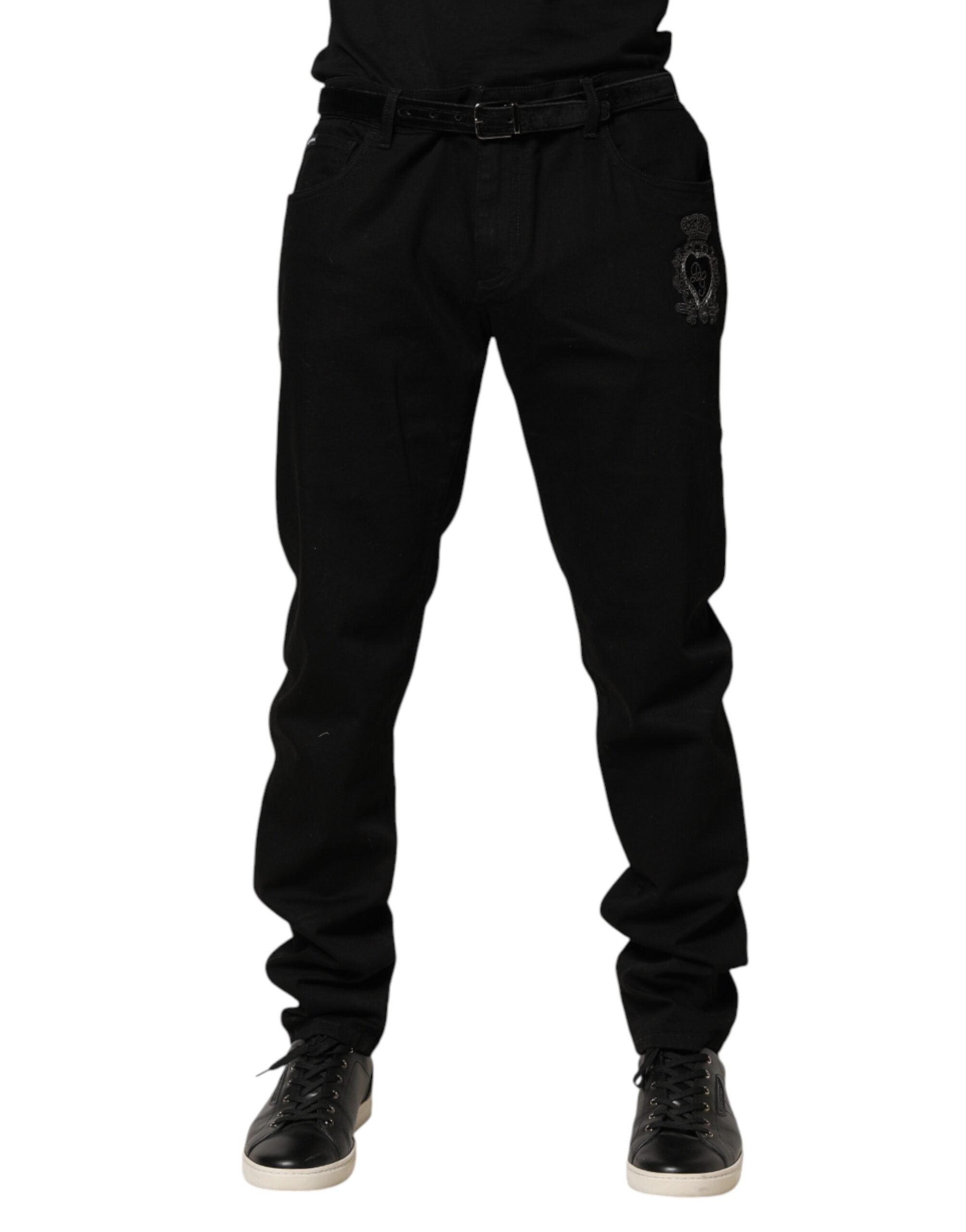 Jeans skinny pour homme Dolce & Gabbana en denim noir avec motif de cœur sacré, style moderne et élégant.