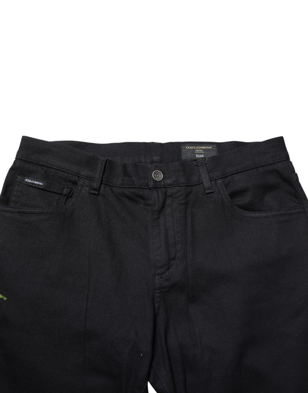 Jean skinny homme Dolce & Gabbana en denim noir à motifs floraux en coton, style élégant et moderne.