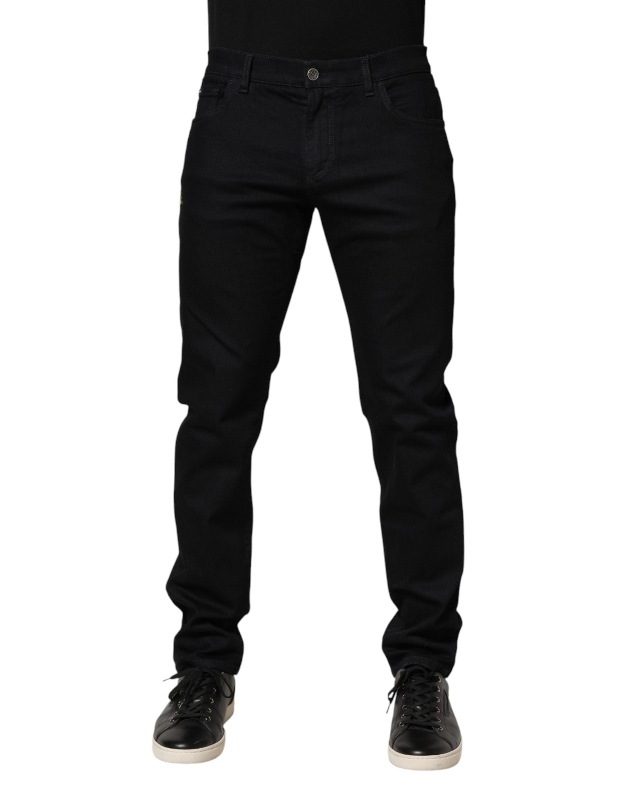 Jeans slim en coton noir à fleurs Dolce & Gabbana pour homme, denim élégant avec motifs floraux.