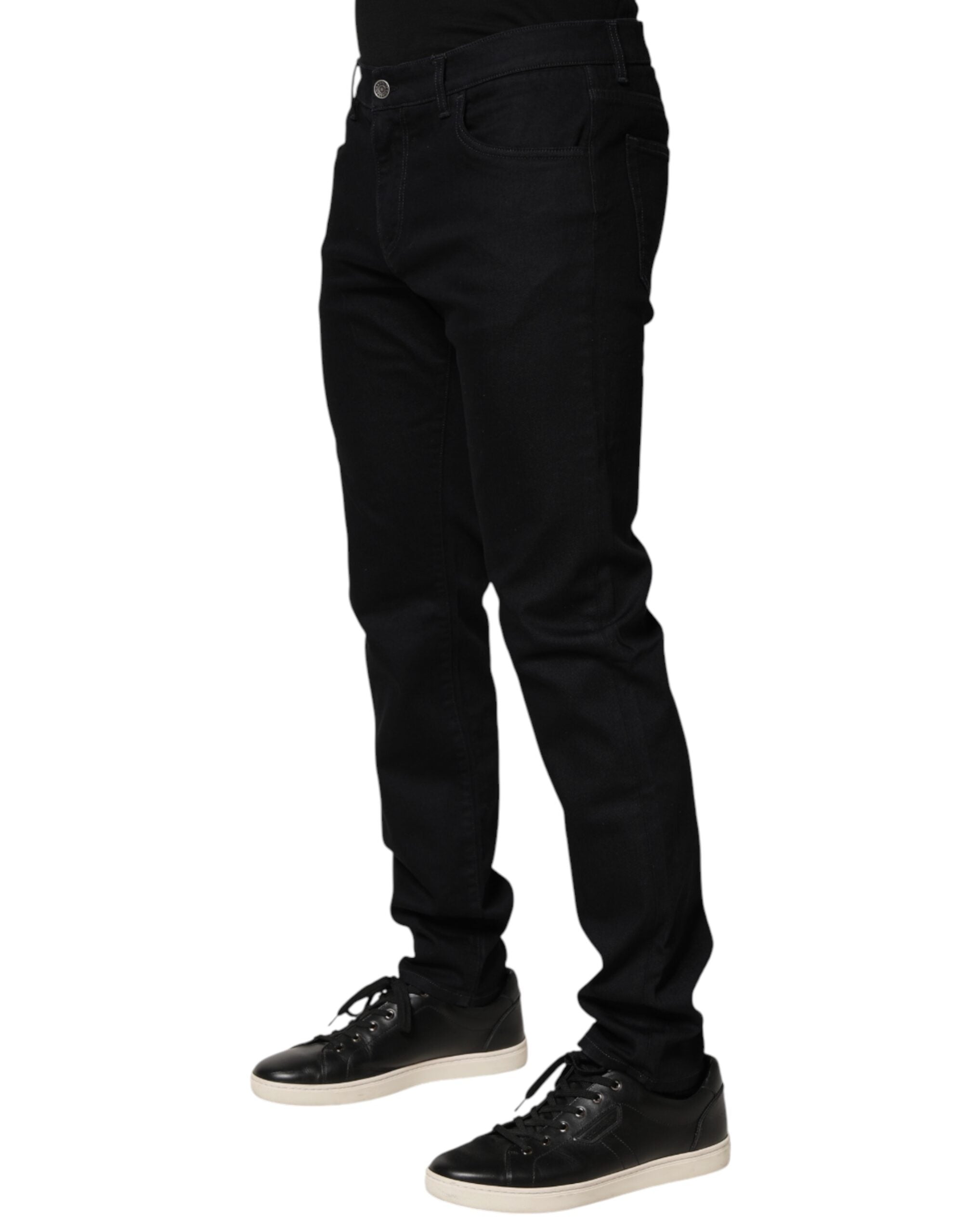 Pantalon skinny en jeans en coton noir à motifs floraux Dolce & Gabbana pour homme, visible avec détails de design floral.