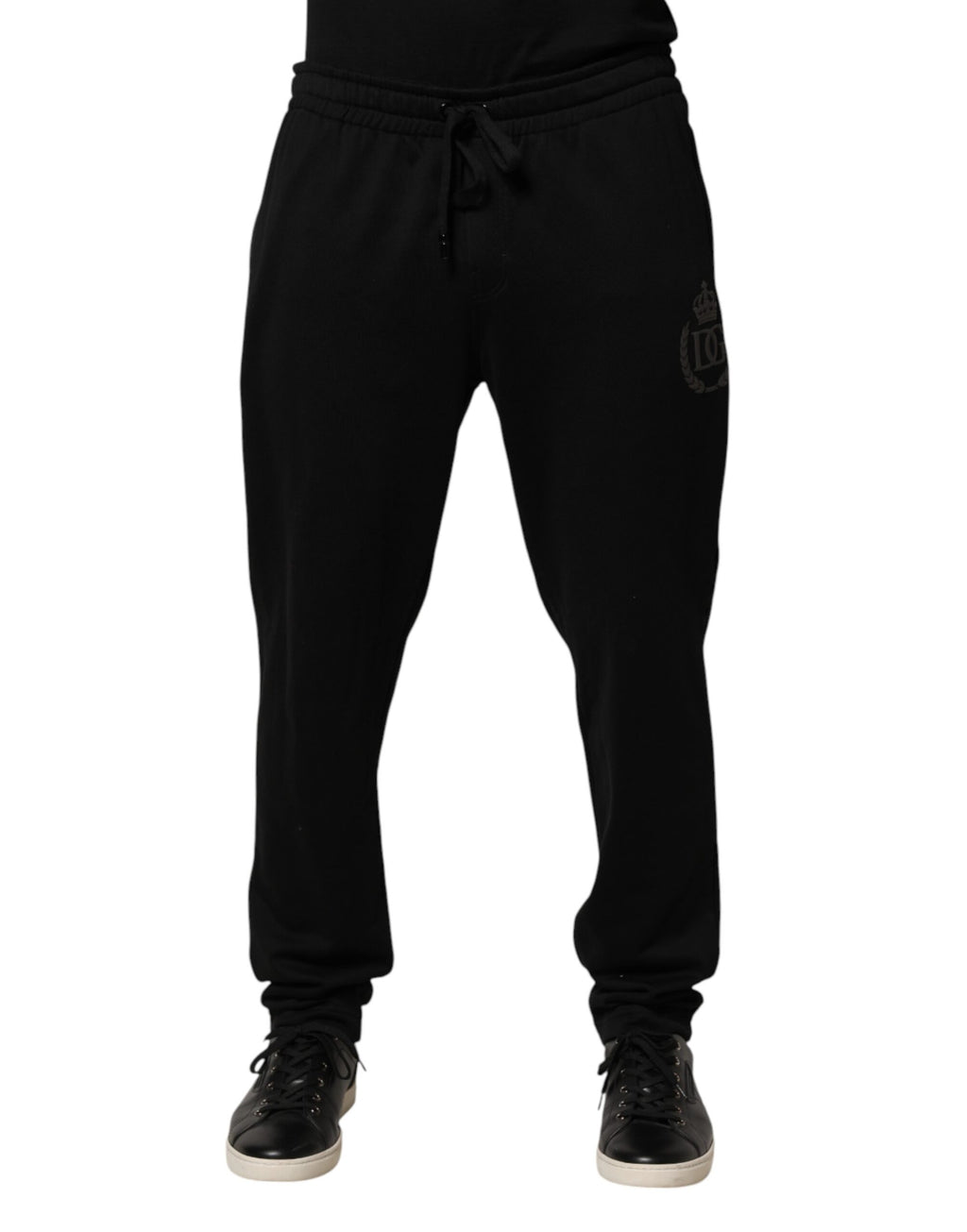 Pantalon slim en coton noir Dolce & Gabbana avec logo, style jogger, ajusté, avec ceinture élastique et poches latérales.