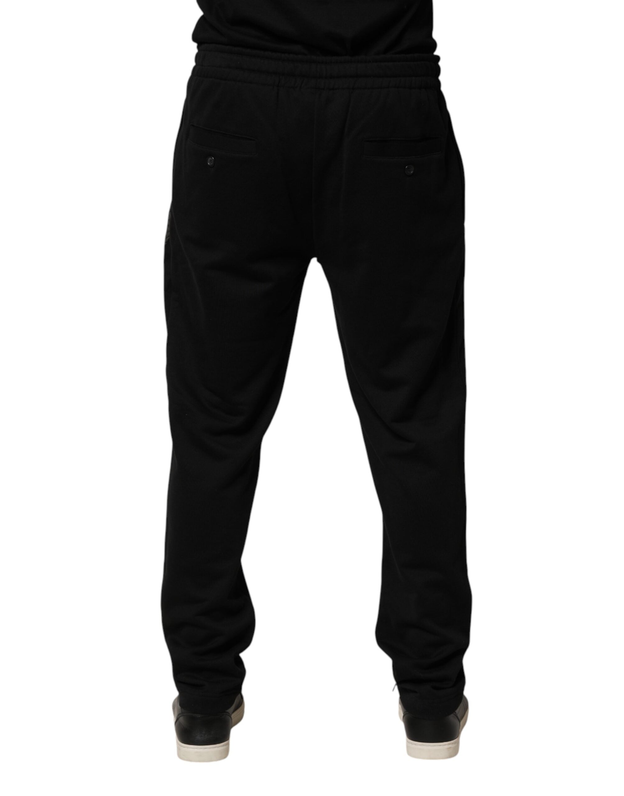 Pantalon jogging slim en coton noir Dolce & Gabbana avec logo, ajusté et confortable, pour un style décontracté et élégant.