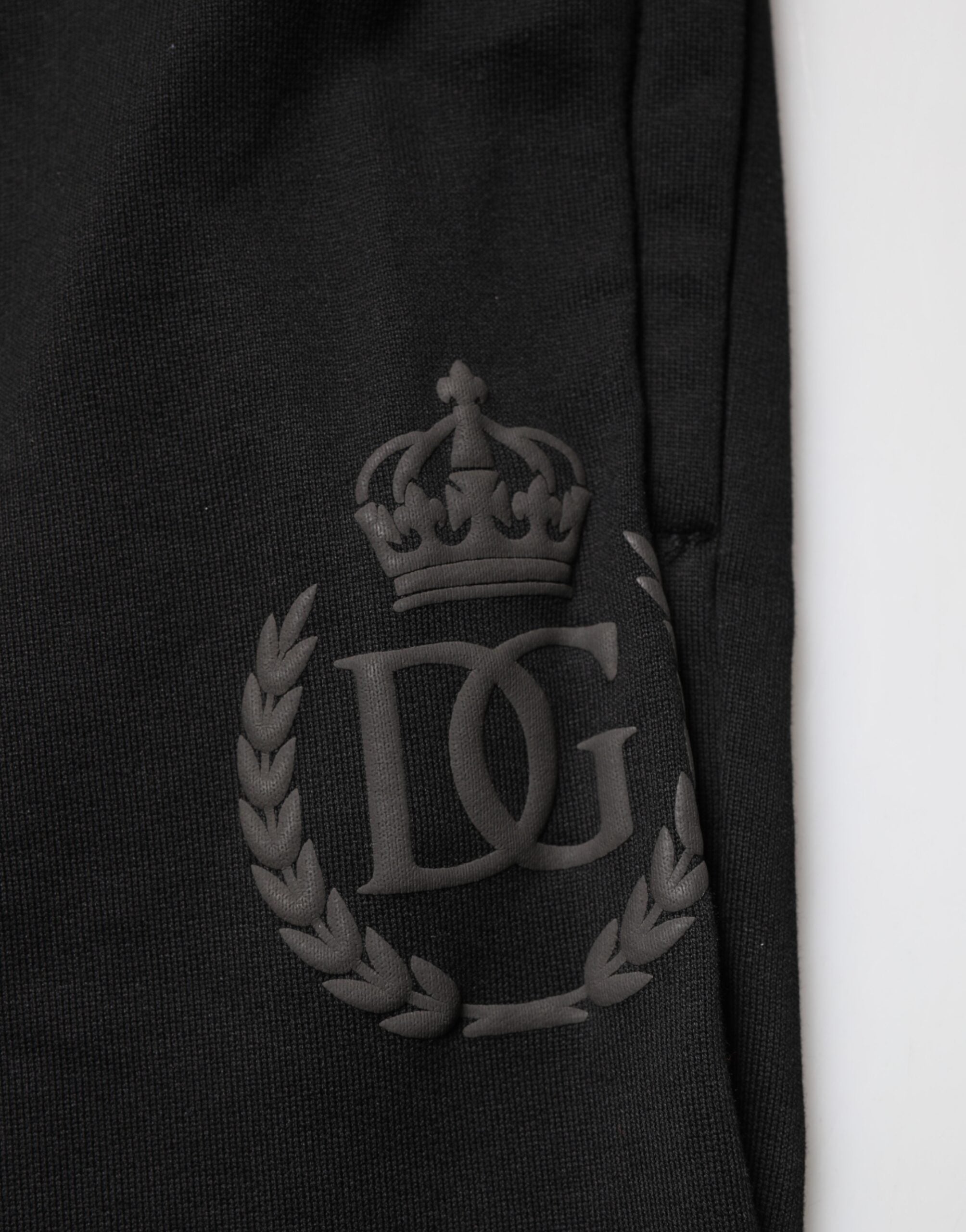 Pantalon jogger skinny en coton noir avec logo Dolce & Gabbana, style décontracté et moderne.