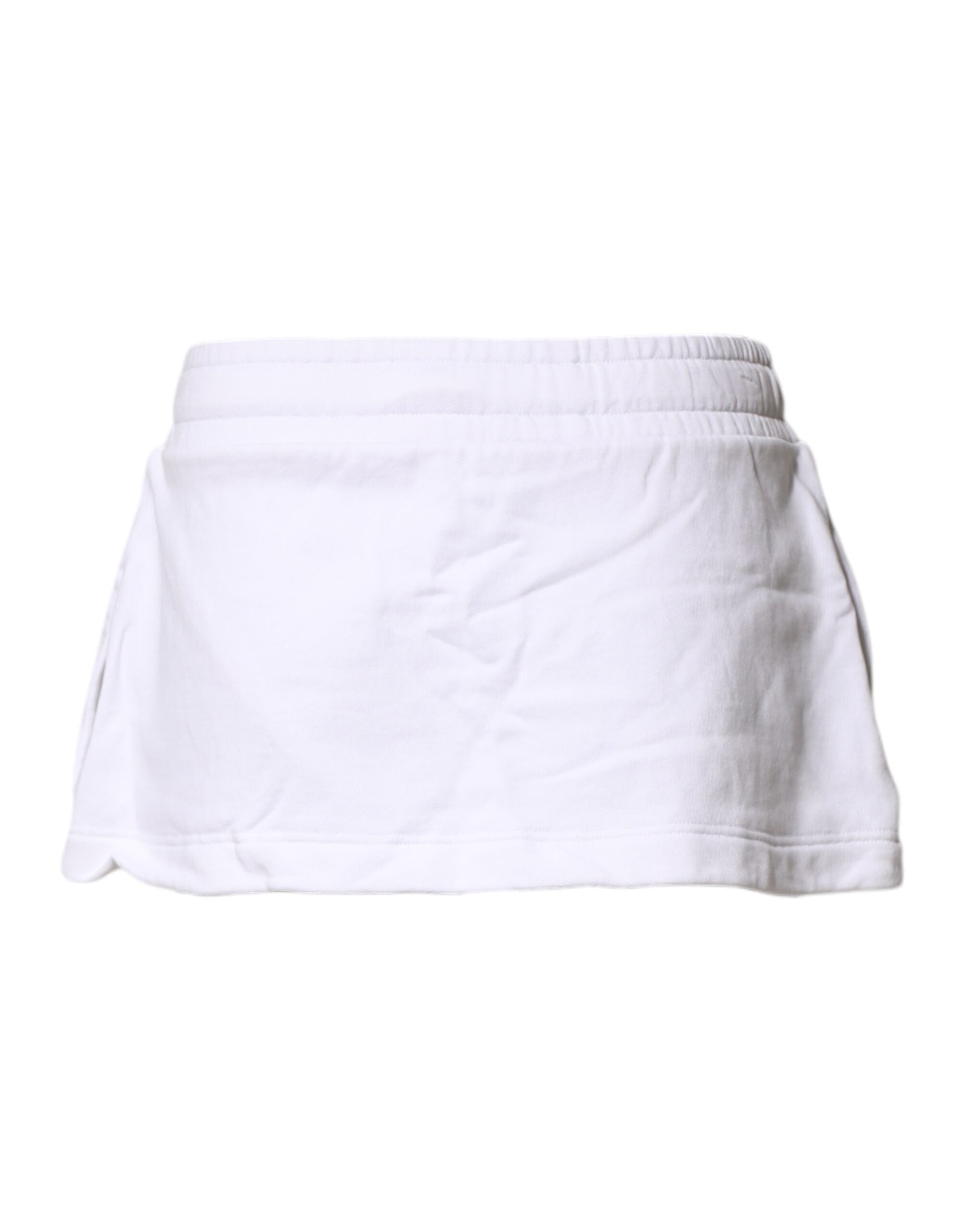 Jupe courte trapèze en coton blanc mi-hauteur de Dolce & Gabbana, style élégant et moderne, vue de face.