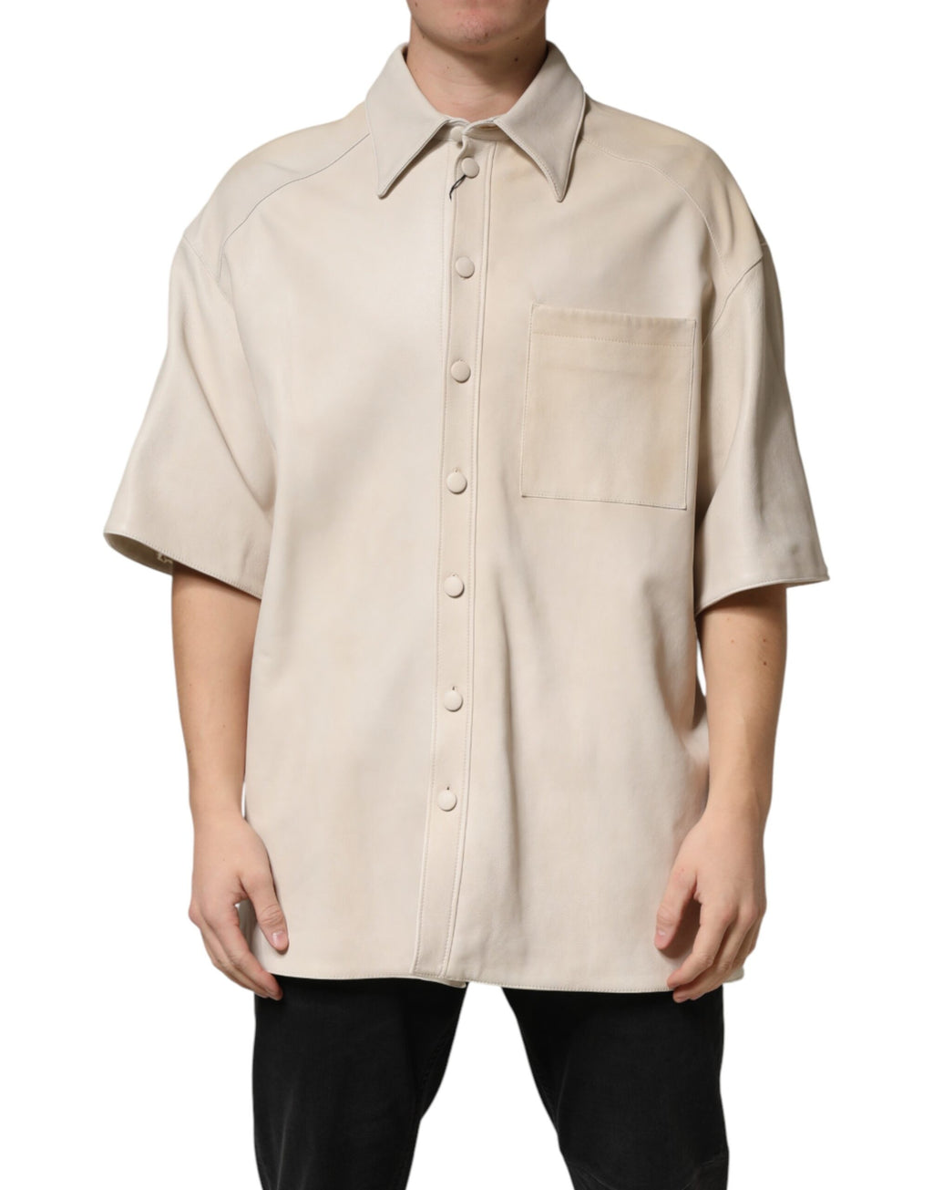 Chemise homme beige en cuir Dolce & Gabbana avec boutons, style casual, visible détails du tissu et de la finition.