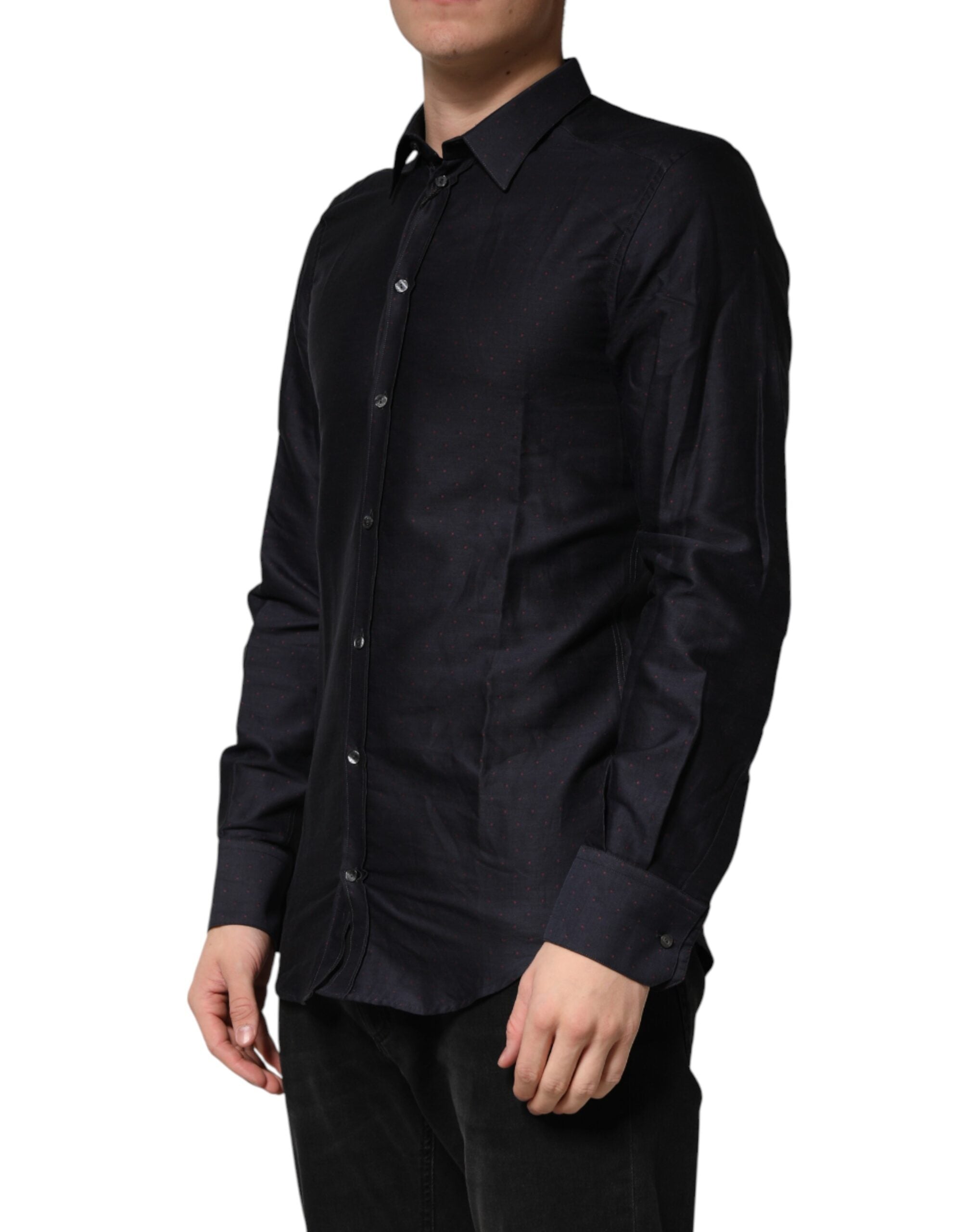 Chemise habillée noire à pois en coton avec col Dolce & Gabbana, détails dorés et look élégant.