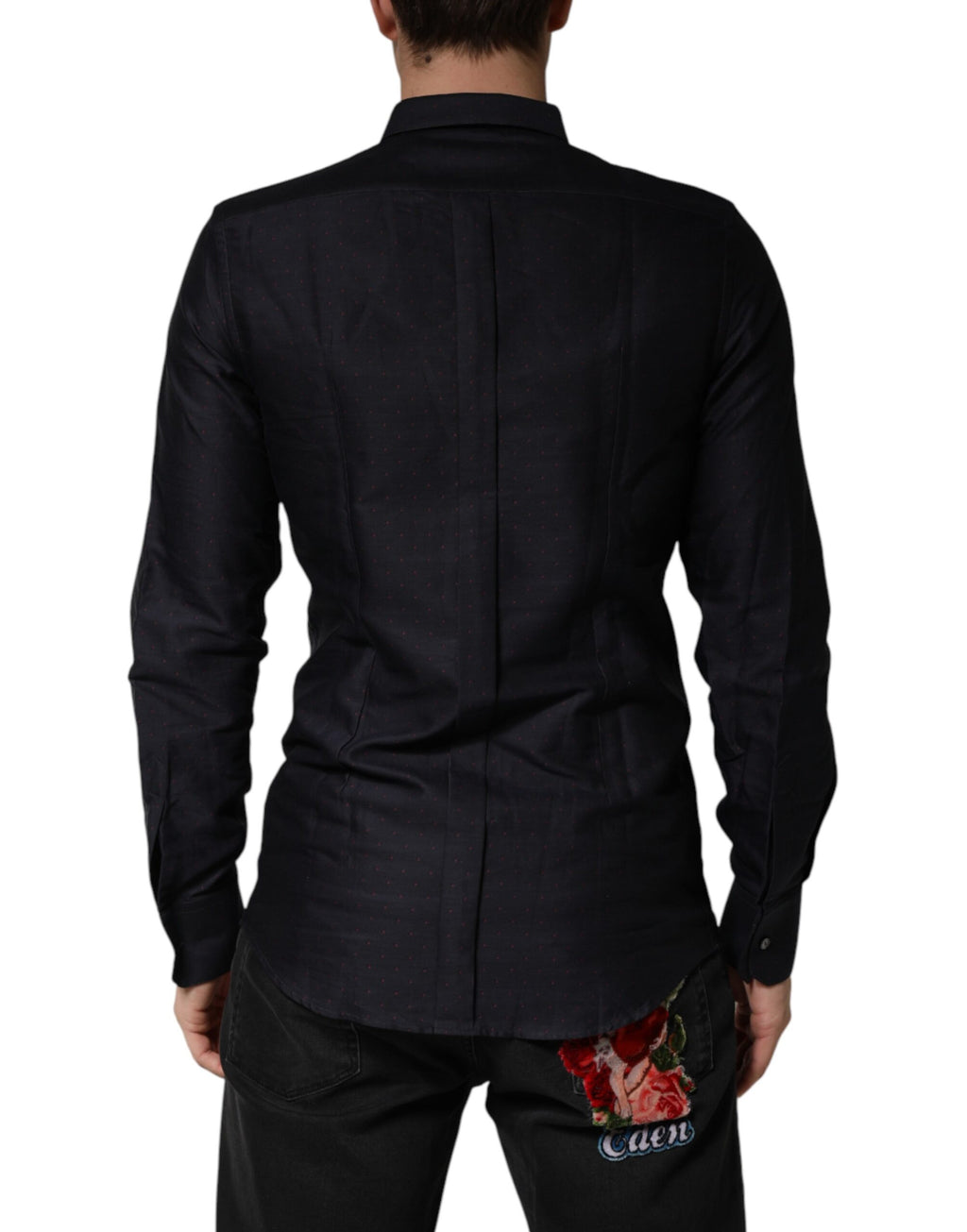 Chemise Dolce & Gabbana en coton noir à pois avec col, manches longues et détails dorés, élégante et sophistiquée.