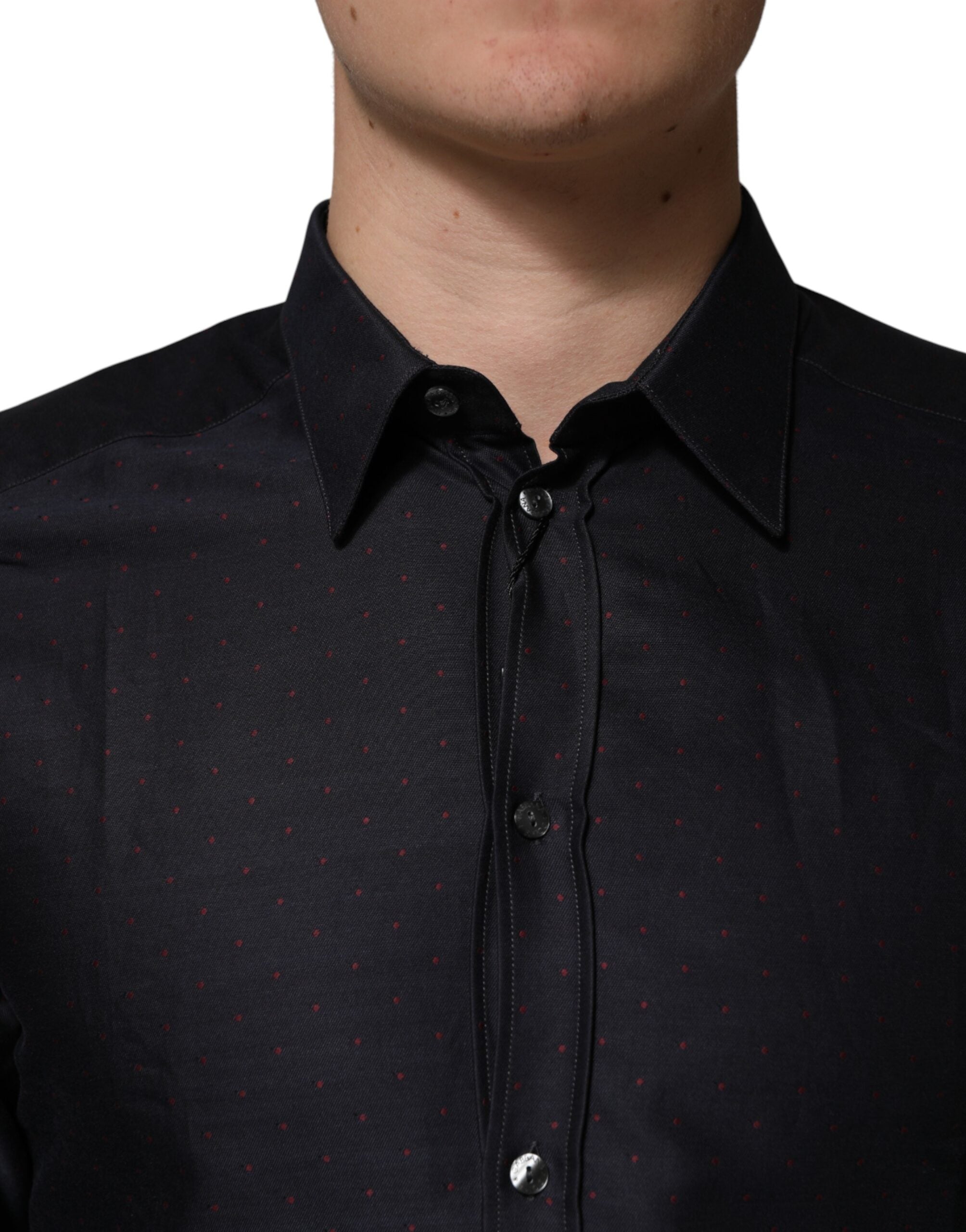 Chemise Dolce & Gabbana noire en coton à pois avec col, manches longues et détails dorés.