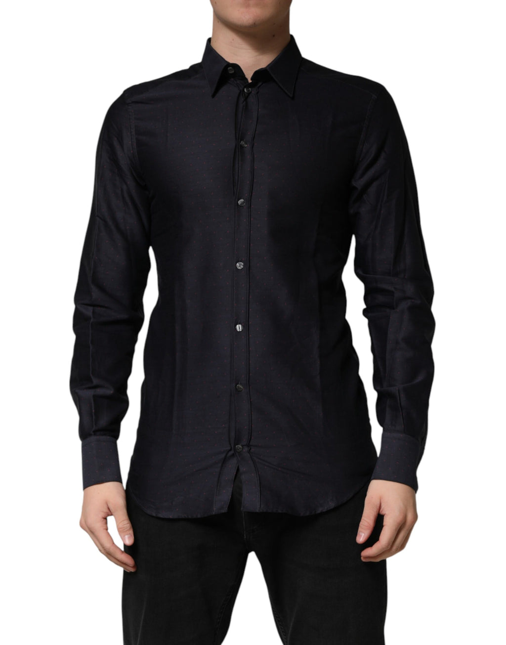 Chemise homme Dolce & Gabbana noire à pois en coton avec col et détails dorés, style élégant et sophistiqué.