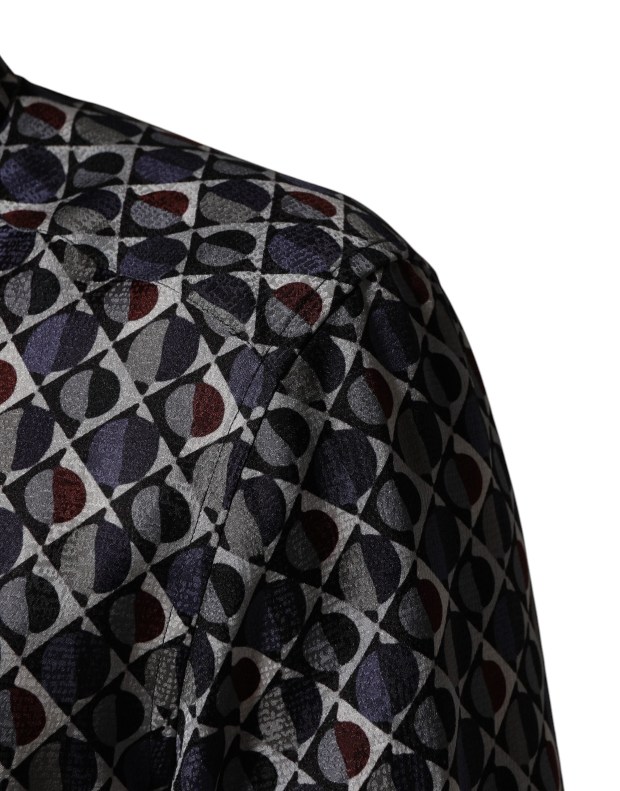 Chemise homme Dolce & Gabbana à col avec motif multicolore et détails dorés, style élégant et sophistiqué.