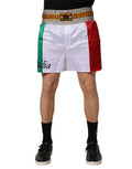 Shorts Bermuda multicolores en polyester Dolce & Gabbana, motif Italia, vue de face avec ceinture et détails colorés.