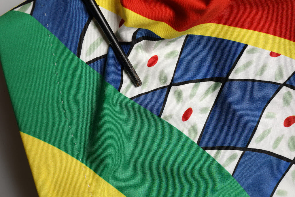 Shorts bermuda pour homme Dolce & Gabbana Carretto multicolore avec motif coloré et design élégant.