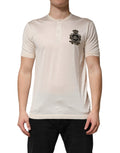 T-shirt homme Dolce & Gabbana en soie blanche avec logo et patch, style henley, à manches longues et design élégant.