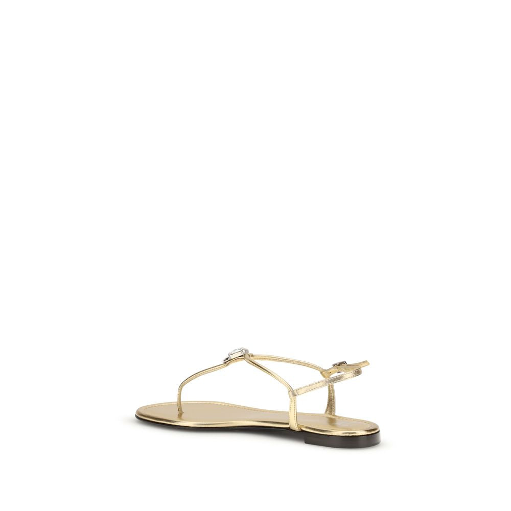 Sandales plates en cuir de veau or Giuseppe Zanotti Bos Taurus, profil avec bride élégante et semelle plate.