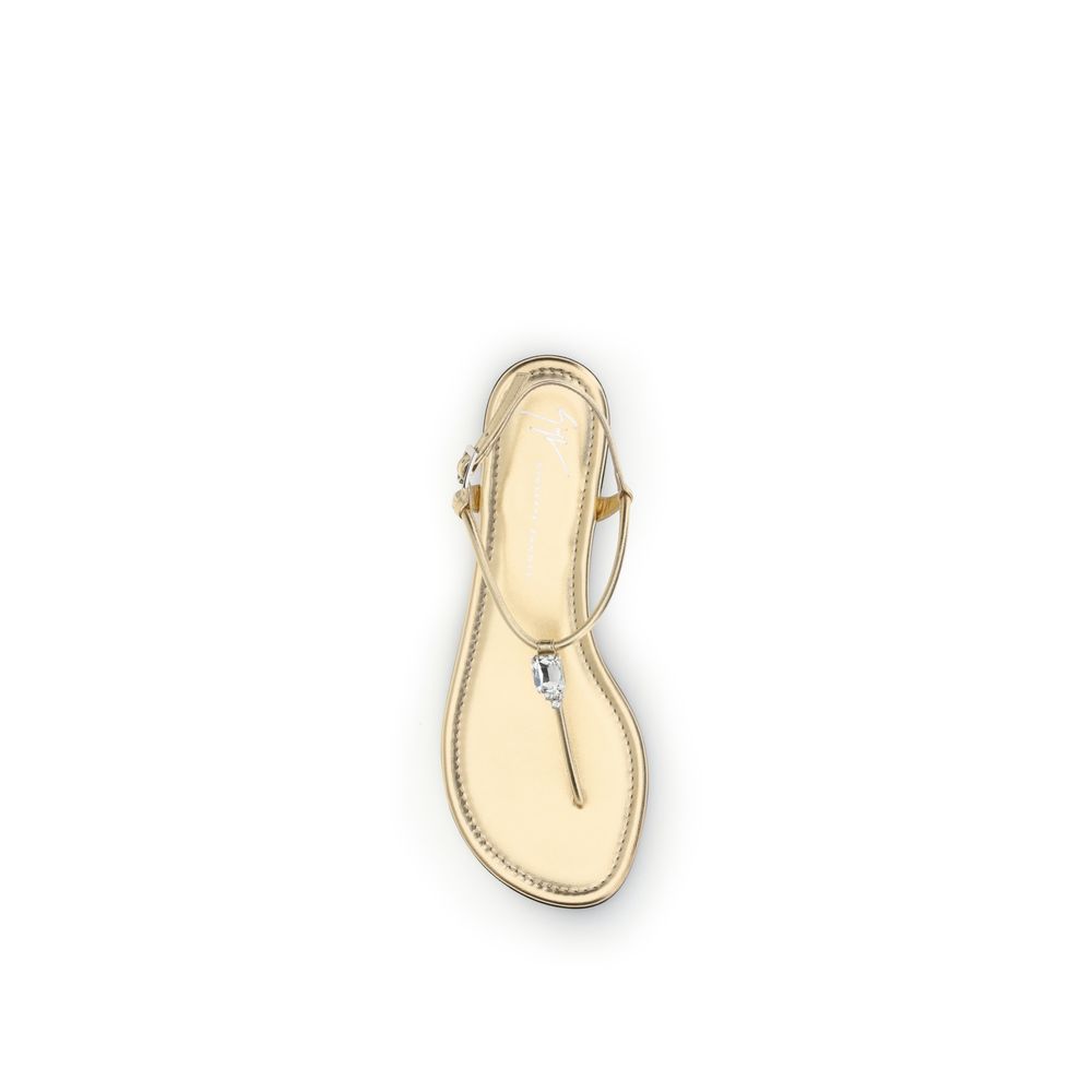 Sandales plates en cuir de veau doré Giuseppe Zanotti Bos Taurus, élégantes et confortables pour femmes.