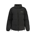 Veste en polyester noire pour femme de Guess Jeans, coupe élégante avec détails modernes et design tendance.