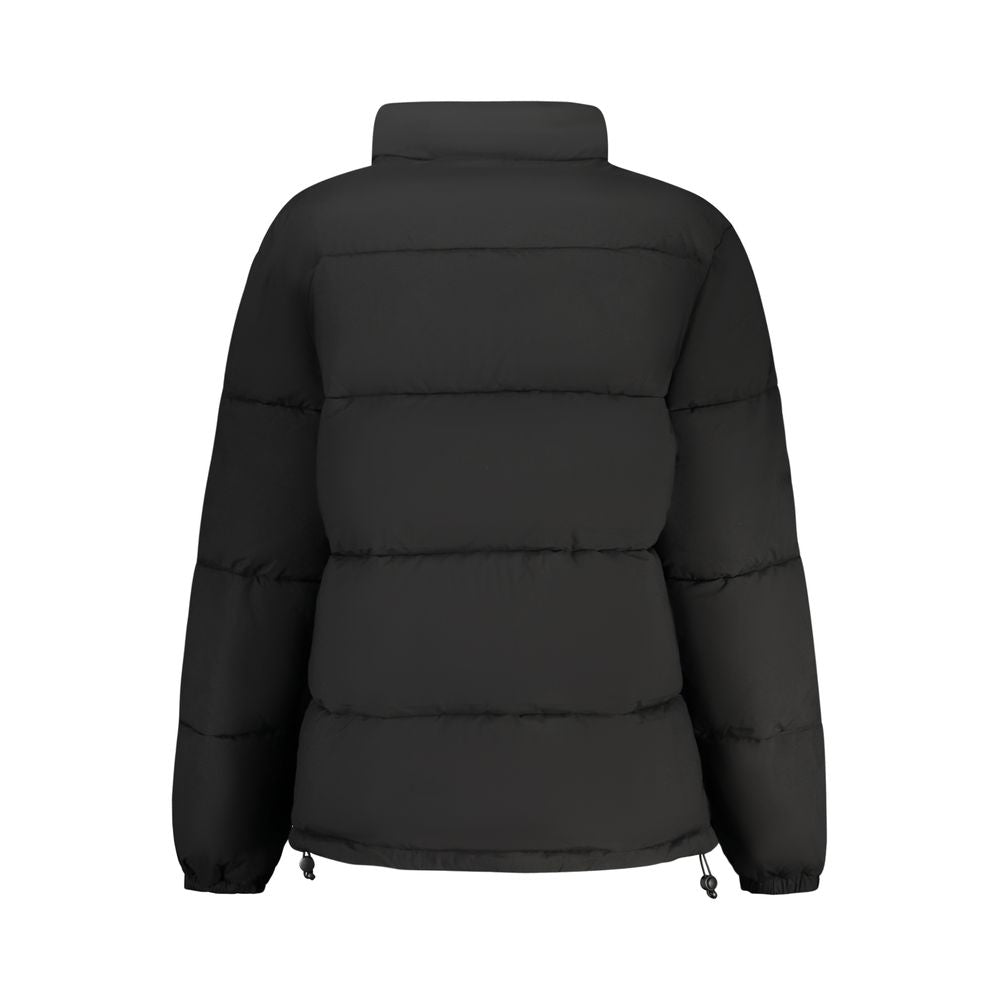 Veste en polyester noire pour femme de la marque Guess Jeans, style décontracté avec fermeture éclair et poches latérales.