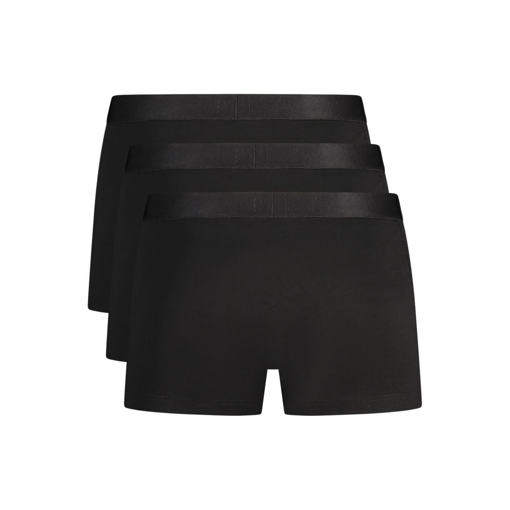 Boxers pour hommes en coton noir de la marque Hugo Boss, affichant une coupe classique et une ceinture élastique.
