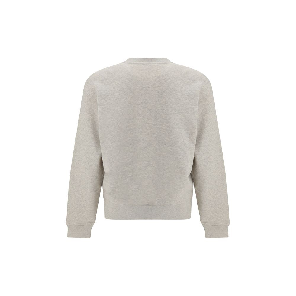 Sweatshirt en coton gris de la marque Kenzo, coupe décontractée, avec logo Kenzo visible sur le devant.