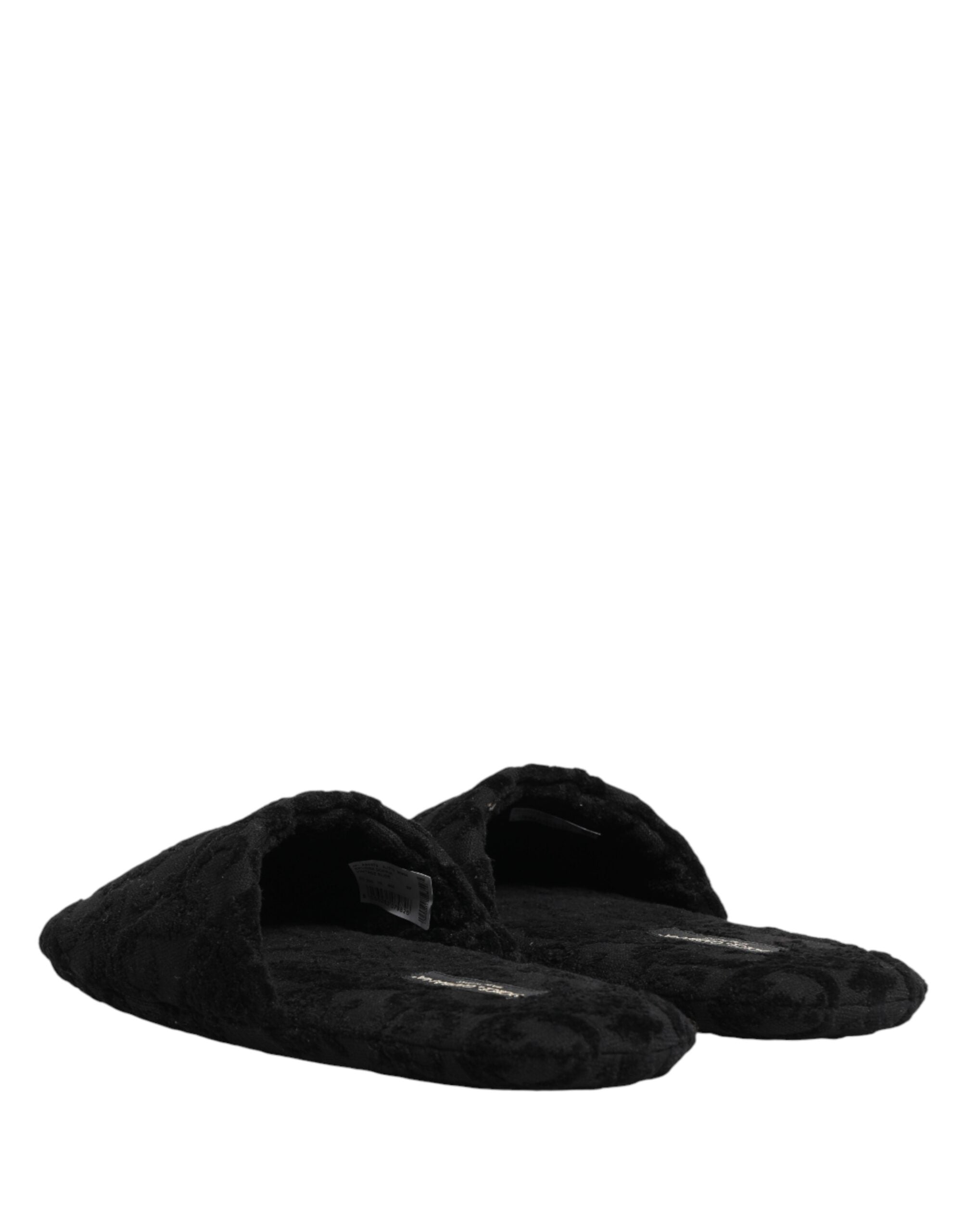 Chaussures plates Dolce & Gabbana, slippers noires avec logo brodé, chaussures élégantes et confortables pour femmes.