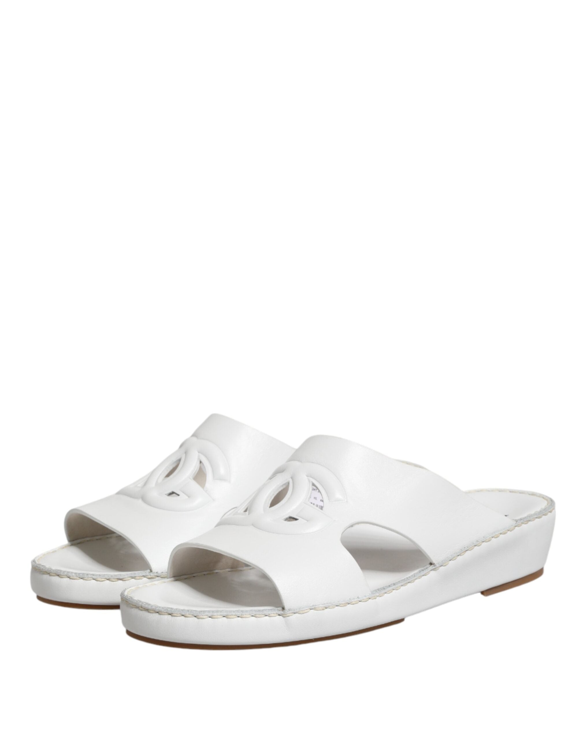 Sandales plates blanches Dolce & Gabbana DG avec découpes, chaussures confortables et élégantes pour femmes.