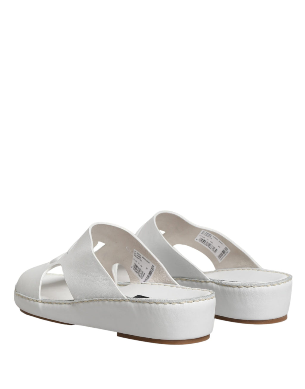 Sandales plates blanches Dolce & Gabbana DG avec découpes, chaussures confortables et élégantes pour femmes.
